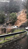 Flooding Waterfall Threatens Bridge