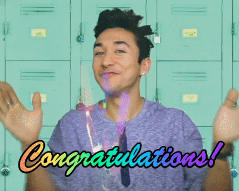 Video gif. A man claps very happily with confetti exploding between his hands. Text, "Congratulations!"