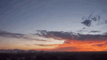 the-panozzo-team realtor realestate sunset clouds GIF
