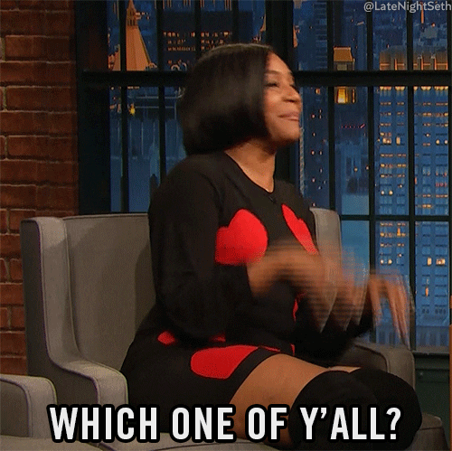 Celebrity gif. Tiffany Haddish on Late Night with Seth Meyers puts her fingers on her chin and quickly looks around at the audience with evil eyes as she jokingly says, “Which one of y'all?”