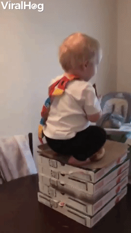 Cheeky Toddler Caught Helping Himself to Pizza