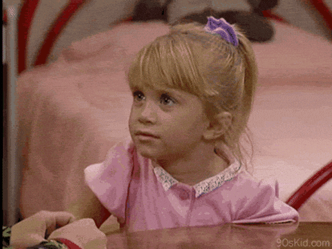 the young girl with pink dress said 'Duh' gif