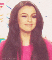 flirty wink GIF