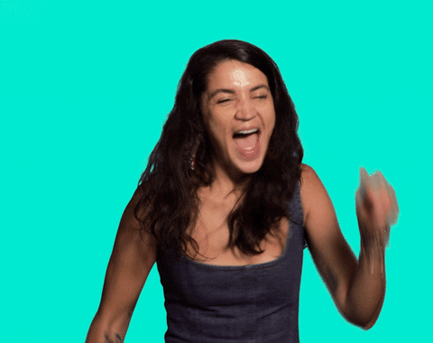 Video gif. Against a solid cyan background, an excited young woman seems to be shouting victoriously as she pumps her arms from side to side. She then claps with her hands close together as if praying and bows her head.