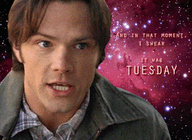 Photo gif. A photo of Jared Padalecki as Sam in Supernatural. The galaxy is orbiting around him and text reads, "And in that moment I swear it was Tuesday."