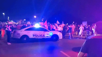 Miami Protesters Hold Demonstration Outside Florida Military Base