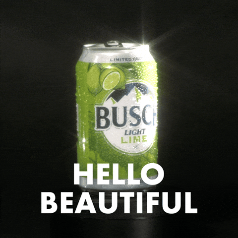 Sponsored gif. Can of Busch Light beer in the lime flavor rotates in place slowly. Its dewy exterior shines in the light. Text reads, “Hello beautiful.”