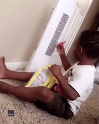 Hot, Hot, Hot: Little Boy Tries to Cool Spicy Snacks With Fan