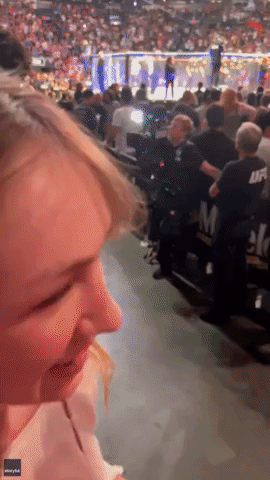 UFC Fan Trying to Rush Into Ring Bounced by Security