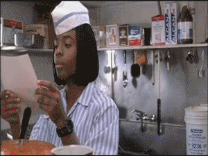 Movie gif. Kel Mitchell as Ed in Good Burger, looks at a piece of paper in the kitchen. He points to something on the page and nods, then looks to someone off screen and says, "I know some of these words."