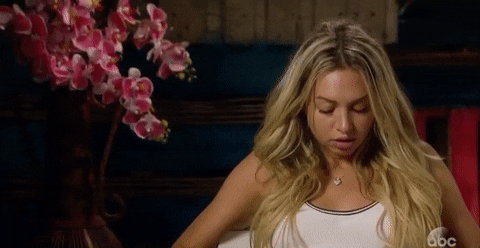 Reality TV gif. Corinne from the Bachelor sits in a confessional. She rolls her eyes and throws her head back dramatically, exasperated or tired of the drama. Can't blame her, really.