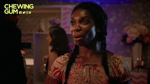 michaela coel wink GIF by Chewing Gum Gifs