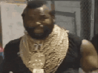 Celebrity gif. Mr. T dances, moving robotically, and using his hands to pivot his head to the side.