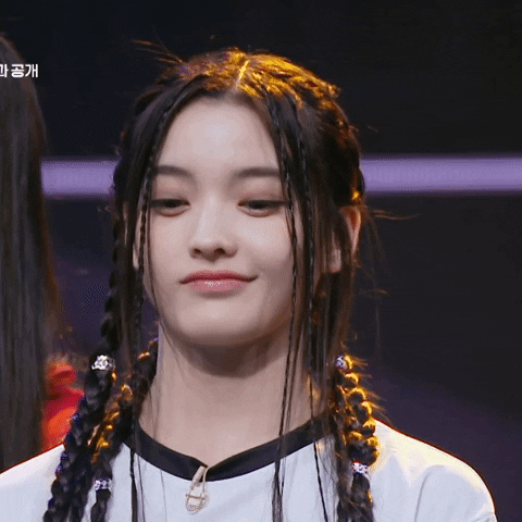 K-Pop Smirk GIF
