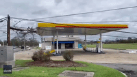 Toppled Trucks and Ruined Gas Station Show Ida's Impact on New Orleans Area