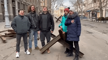 Ukrainian Vocalists Sing Next to Barricades Outside City Opera House