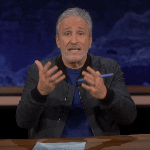 TheProblemWithJonStewart tv idk shrug hmm GIF