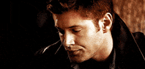 licking lips looking up GIF