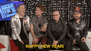 Video gif. The hosts of Dick Clark's New Years Rockin Eve with Ryan Seacrest 2016 say, "Happy New Year!"