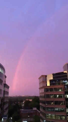 Rainbow and Lightning Combine in Evening Sky as Storm Fades in Maryland