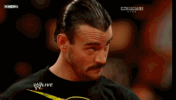 Sports gif. A wrestler from WWE shakes his head and blinks his eyes incredulously, reacting shocked and taken aback. 