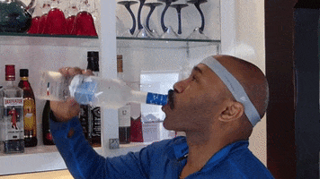 Drinking From The Bottle Reaction GIF by Robert E Blackmon