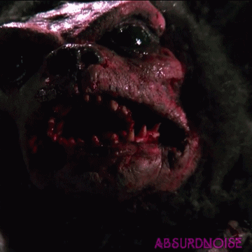 demonic toys horror movies GIF by absurdnoise