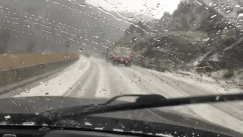 Heavy Hail Covers Colorado Highway