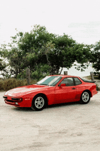 1986red944 beach porsche 944 beach car GIF