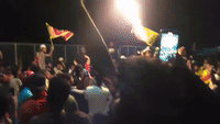 Protester Shoots Flames Into the Air Near Sri Lankan Presidential Secretariat