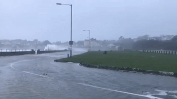 Large Waves Crash Over Welsh Road as Storm Ciara Bears Down