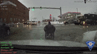 Indiana Officer Helps Wheelchair User Cross Slushy South Bend Intersection