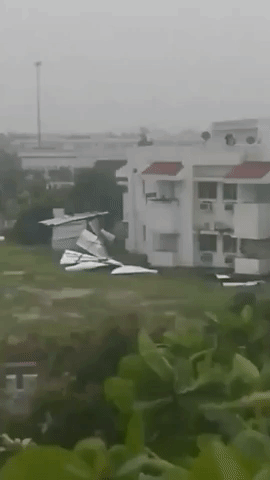 Wild Winds Knock Structure in Paradeep, India, Ahead of Cyclone Amphan Landfall