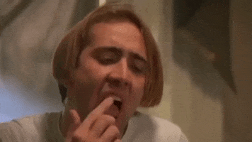 yum tasty teeth cage nicolas GIF