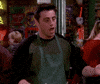 Friends gif. Matt LeBlanc as Joey wears an apron and an earnest look as he smiles, gestures, and says, "Happy birthday to you," which appears as text.