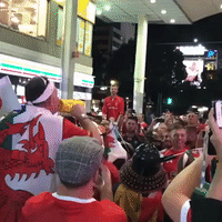 Wales Rugby Fans Sing in Packed Japan Shopping Street