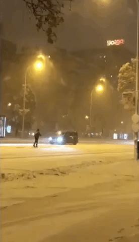 Skier Takes to Madrid Street as Storm Filomena Drops 'Historic' Snowfall