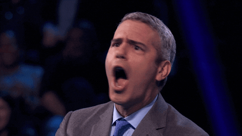 Reality TV gif. In a clip from Love Connection (2017), a surprised, slack-jawed Andy Cohen looks around at the audience.