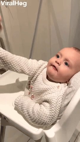 Baby Tastes Chocolate Cereal for the First Time