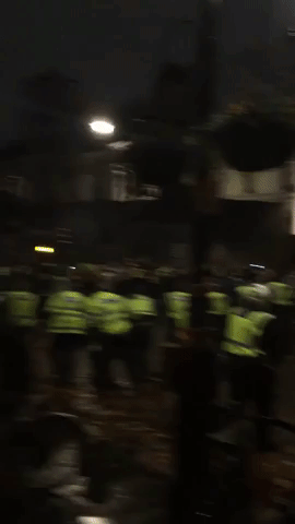 Police 'Kettle' Million Mask March in Central London