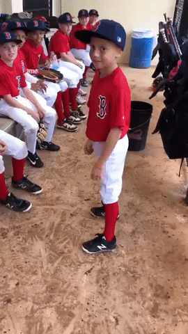 In a Little League of His Own: Young Baseball Player Gets His Team Fired Up Before Their Game