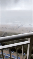 Storm Sends Umbrellas Hurtling Over Waves in North Myrtle Beach