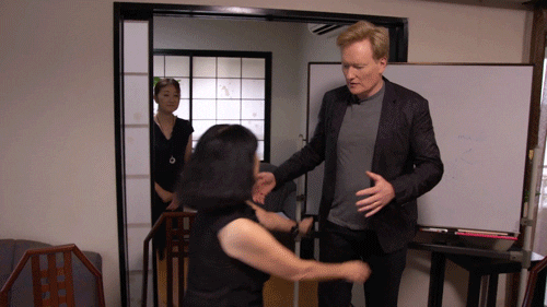 hugging hug GIF by Team Coco