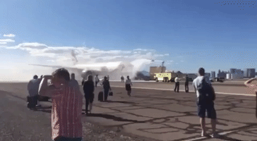 Passengers on Tarmac After Plane Catches Fire