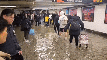 Water Floods Walkway Inside Brooklyn Subway Station