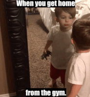 Video gif. A young boy looking himself up-and-down in the mirror, then kissing himself. Text, "When you get home from the gym."