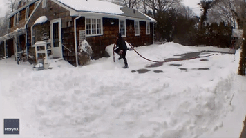 Oil Delivery Driver Clears Snowy Steps for Elderly Woman