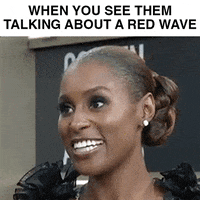 Celebrity gif. Issa Rae on the red carpet at the 2018 Golden Globes throws her head back in uproarious laughter. Text, "When you see them talking about a red wave."