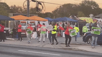 People Dance to Lizzo Near Polling Station in Atlanta