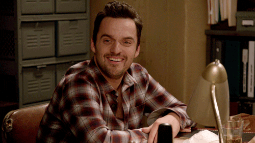 TV gif. Jake Johnson as Nick in New Girl gags as if grossed out. 